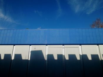 Low angle view of built structure against blue sky