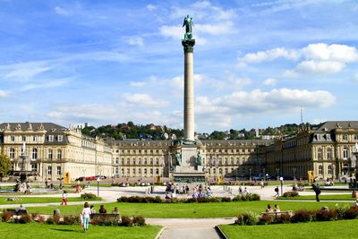 Victory column at schlossplatz against blue sky background