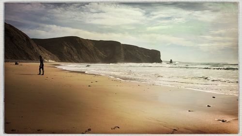 Scenic view of beach against sky