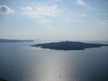 Scenic view of sea against cloudy sky