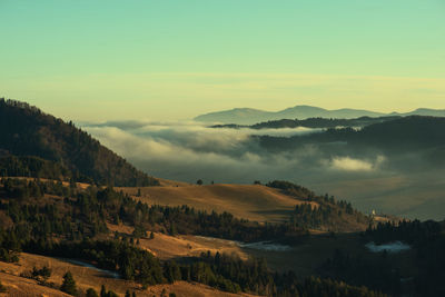 Scenic view of landscape against sky during sunset