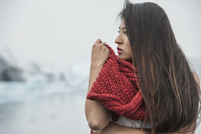 Beautiful woman posing for fashion photoshoot at glacierlagoon