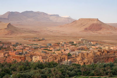 Scenic view of landscape and mountains against sky