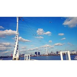 Built structure against blue sky and clouds