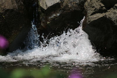 Water splashing on rocks