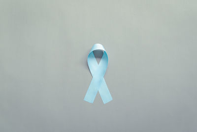 Close-up of sign against white background