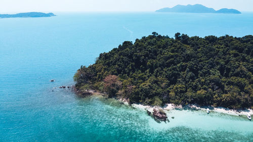 High angle view of swimming pool by sea against sky