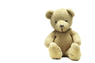 Close-up of stuffed toy against white background