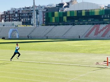 Boy running at the running track in madrid 