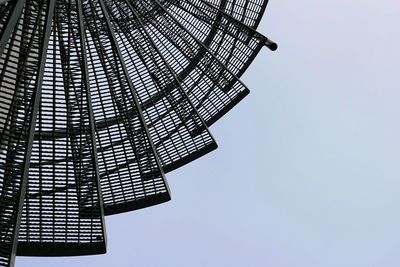 Low angle view of skyscraper against clear sky