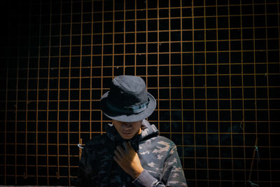 Portrait of young man wearing hat