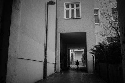 Full length of woman walking in building