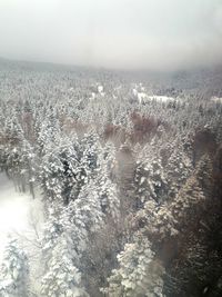 Scenic view of frozen lake against sky during winter