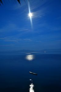 Scenic view of sea against sky at night