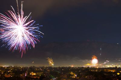 Firework display at night