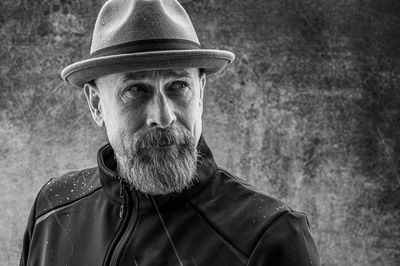 Close-up portrait of man wearing hat