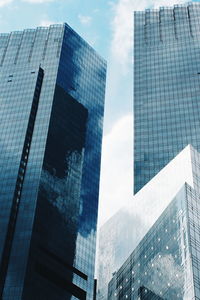 Low angle view of tall buildings against the sky