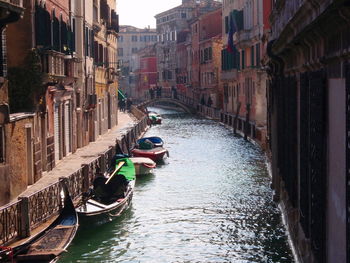 Boats moored in canal