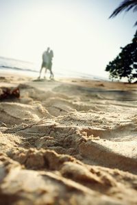 Shadow of people on beach