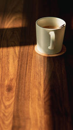 Close-up of coffee cup on table