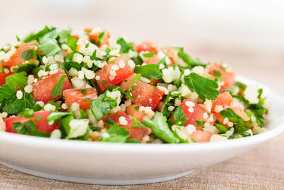 Close-up of salad in bowl on table