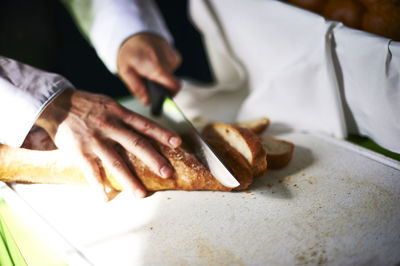 Close-up of man preparing food