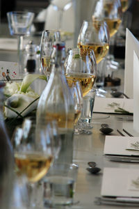 Close-up of glass bottles on table in restaurant