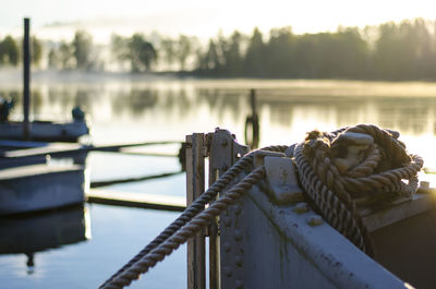 Close-up of boat moored at pier