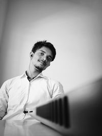 Portrait of young man looking away