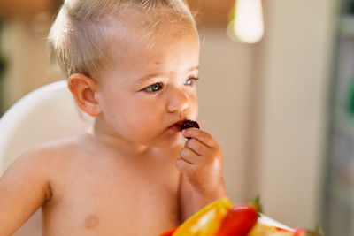 Cute boy eating food