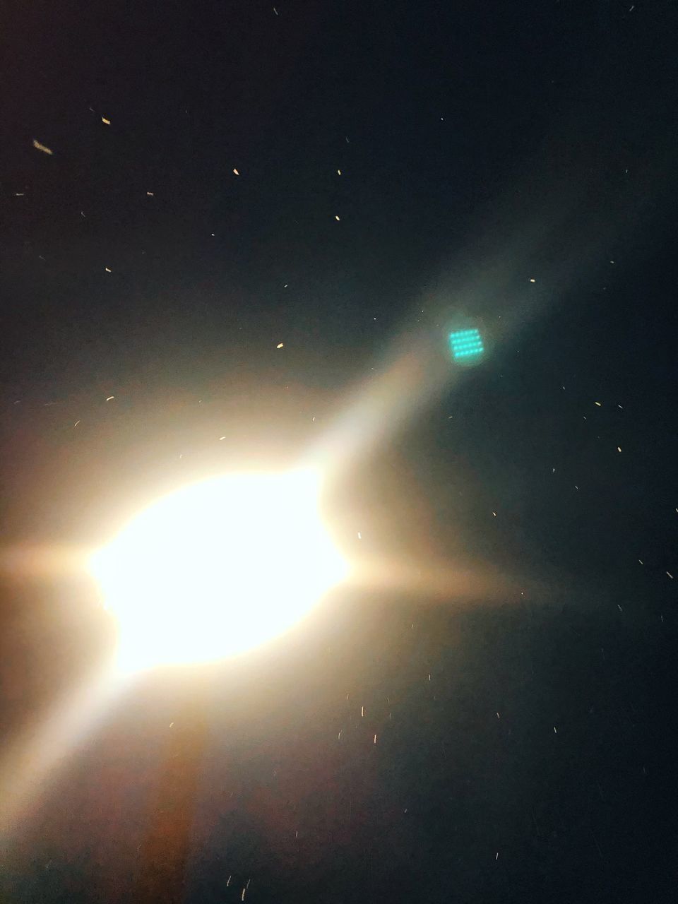 LOW ANGLE VIEW OF ILLUMINATED BRIGHT SKY AT NIGHT