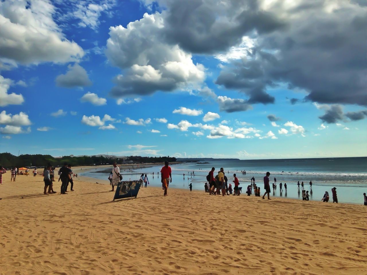 beach, sea, large group of people, water, sky, sand, horizon over water, shore, vacations, cloud - sky, leisure activity, lifestyles, mixed age range, scenics, person, cloud, men, beauty in nature, tranquil scene
