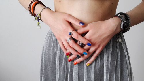 Midsection of woman with hands