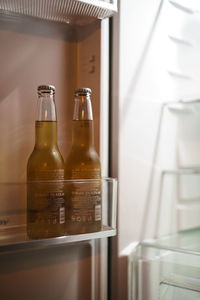 Close-up of wine bottles on table