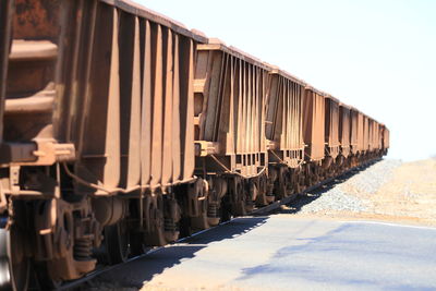 Train on railroad track against sky