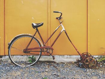 Bicycle parked on road