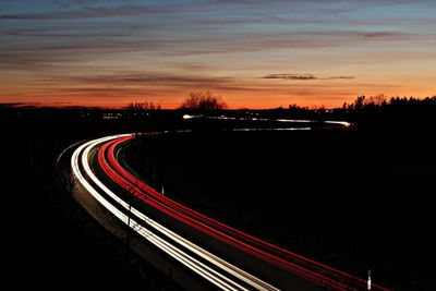 Light trails on road at night