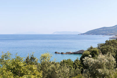 Scenic view of sea against clear sky