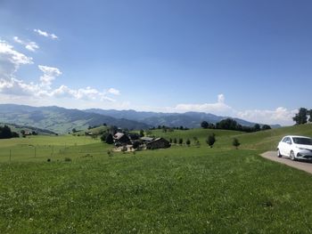 Scenic view of field against sky