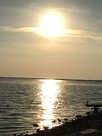 View of calm sea at sunset