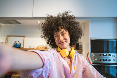 Portrait of young woman with headphones