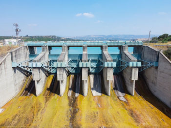 Aerial view of water reservoir and closed reservoir locks of a dam. berdan dam, tarsus,  turkey