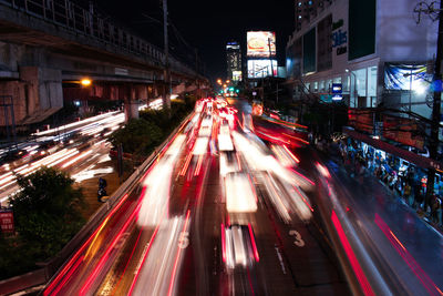 High angle view of light trails on city street at night