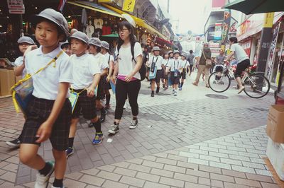 People walking on city street