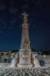 Statue of liberty against sky at night