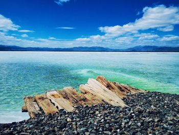 Scenic view of sea against cloudy sky