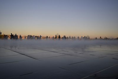 Panoramic view of city buildings against clear sky