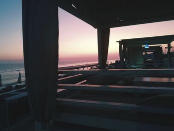View of sea through car window