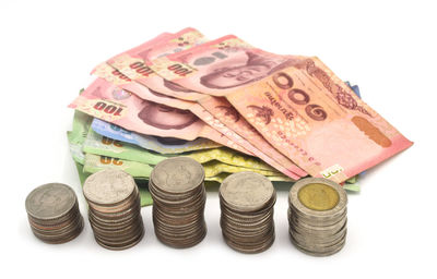 Close-up of coins on white background