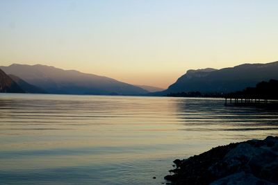 Scenic view of lake at sunset